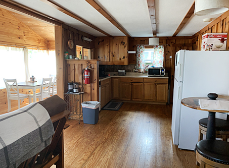 Cook your favorite meals in this  country kitchen complete with full size appliances and cooking accoutrements.