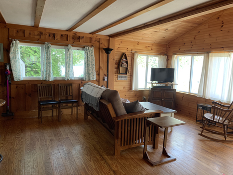 A spacious living room accompanies this setting.